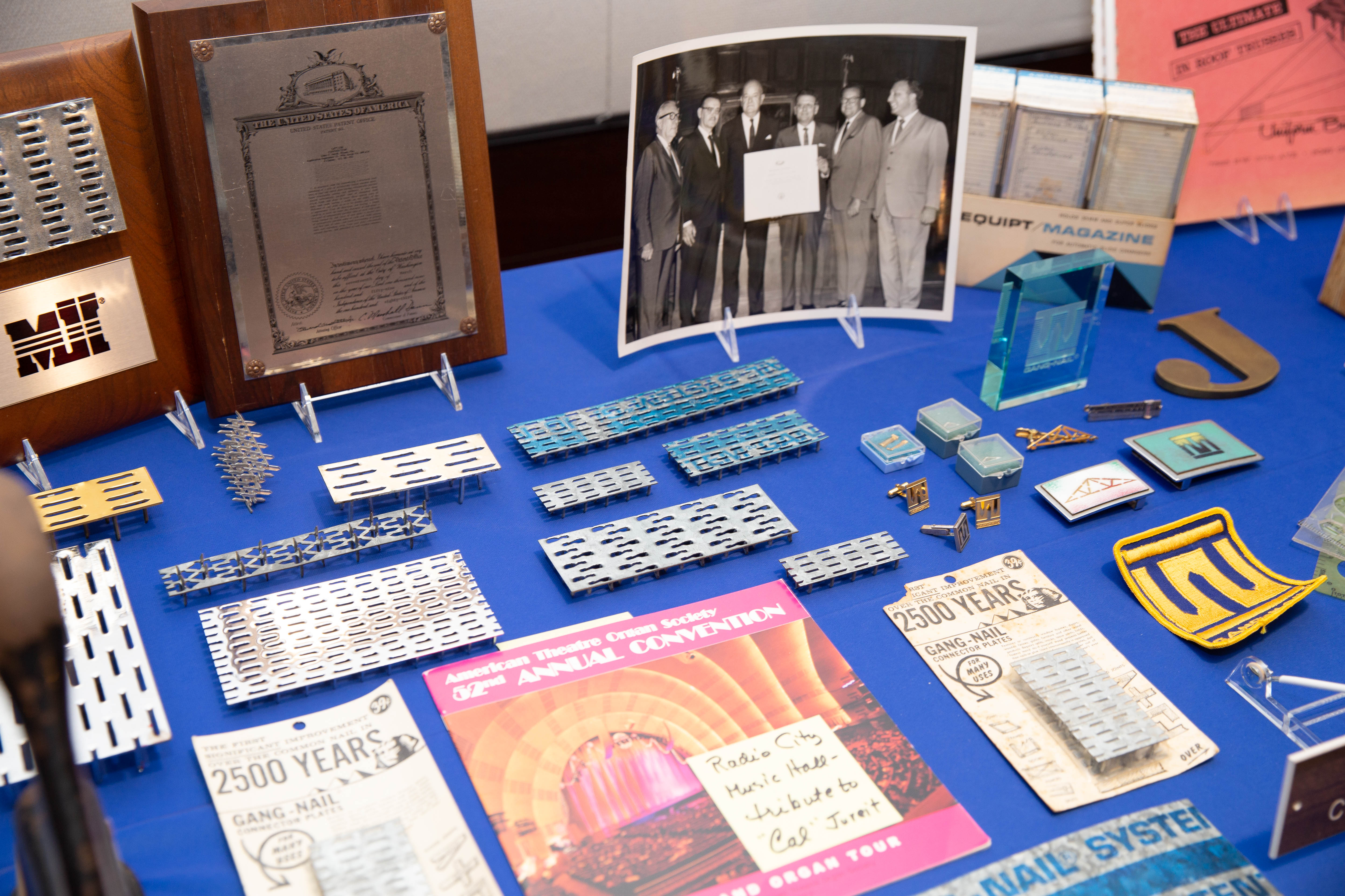 A display of memorabilia donated to MiTek to honor the John Cal Jureit and Gangnail legacy